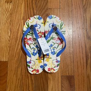 NWT Tory Burch flip flops in size 8. Color: Iris Blue.